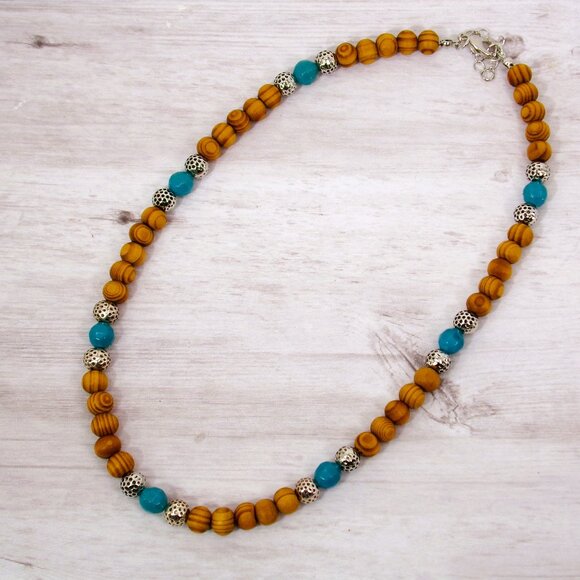 Wood bead necklace created with turquoise color beads and textured silver beads. - Picture 9 of 11